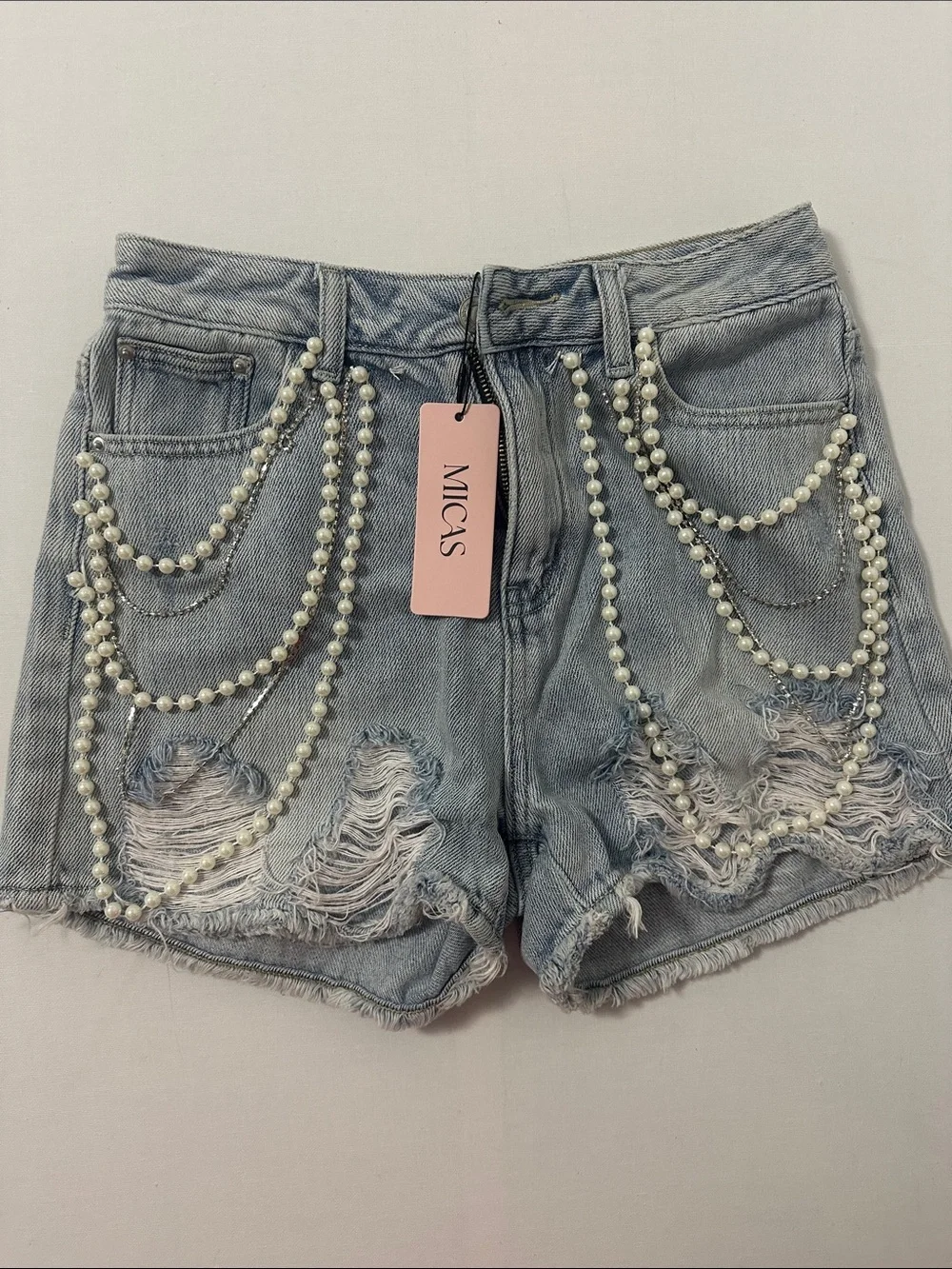 Micas Light Blue Distressed Denim Shorts with Pearl Chain Embellishments
